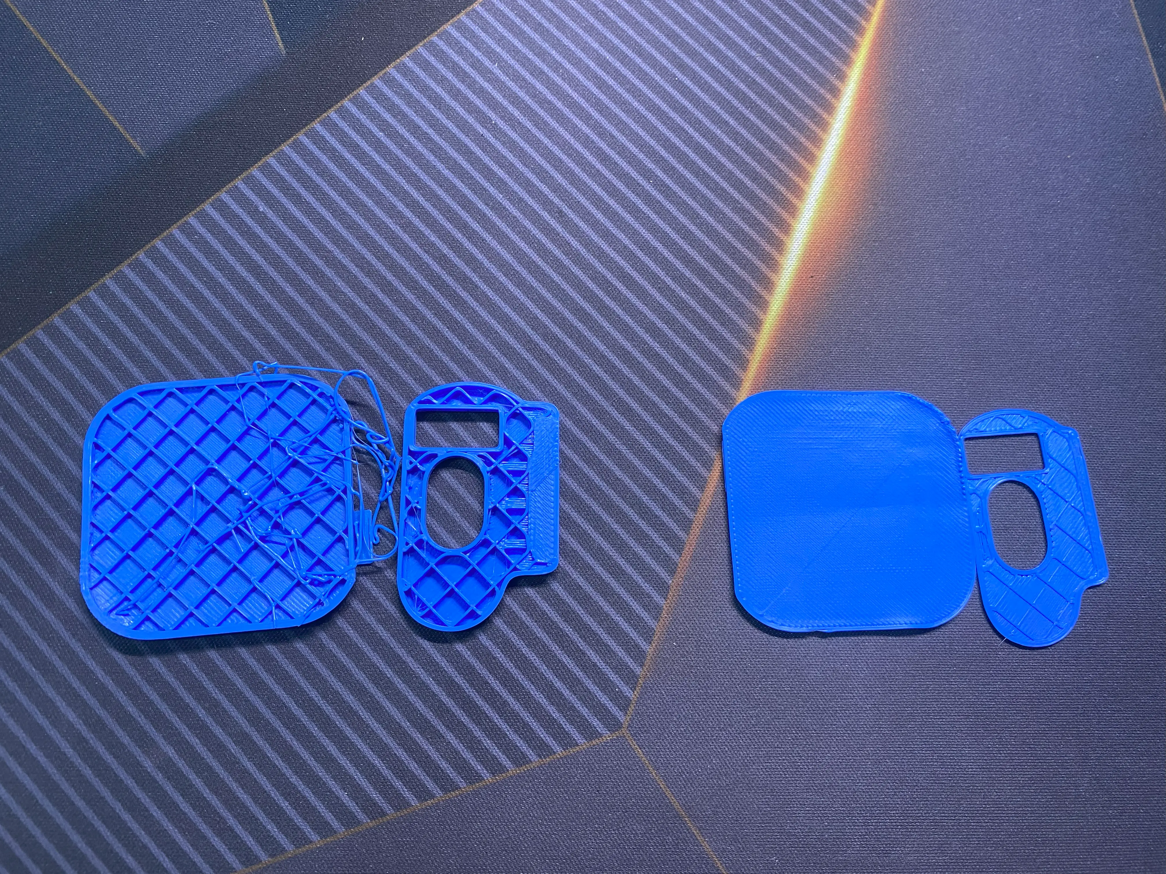 First(left) and second(right) attempts to print the Xiaomi band 9 magnetic charging stand.